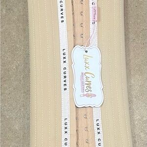 New in package Luxx Curves Beige waist trainer size small, long torso
